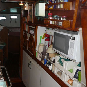 Galley aft inboard shelf Galley aft inboard shelf